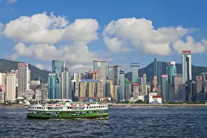 Images Dated 6th November 2009: Star Ferry crossing Victoria Harbour towards Hong Kong Island, with Central skyline