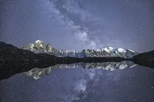 Aguille Chardonnay Gallery: Starry sky over Mont Blanc range seen from Lac de Chesery. Haute Savoie. France Europe