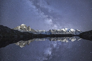 Haute Savoie Gallery: Starry sky over Mont Blanc range seen from Lac de Chesery. Haute Savoie. France Europe