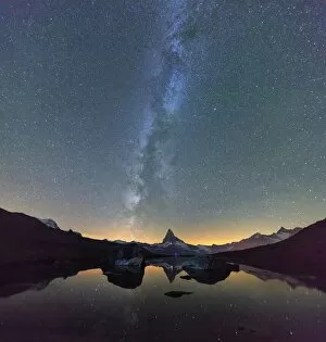 Images Dated 25th February 2016: Stars and Milky Way above the Matterhorn reflected in Lake Stellisee Zermatt Canton