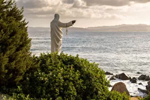 Autumn Season Collection: Statue of Christ on the beach, Sardinia, Sassari province, Italy