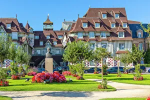 Accommodation Prints: Statue of Francois Andre In Front Of The Normandy Barriere Hotel