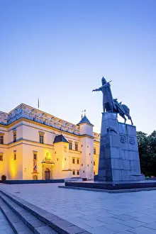 Art Museum Prints: Statue of Grand Duke of Lithuania Gediminas in front of the Palace of the Grand Dukes of Lithuania at Dusk