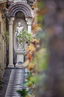 Buenos Aires Prints: Detail of a statue inside the Atis Bar'in autumn, San Telmo, Buenos Aires