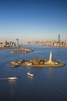 Images Dated 19th November 2015: Statue of Liberty, Jersey City and Lower Manhattan, New York City, New York, USA