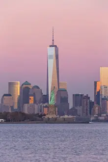 Statue of Liberty, One World Trade Center and Downtown Manhattan across the Hudson River