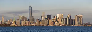 Statue of Liberty, One World Trade Center and Downtown Manhattan across the Hudson River