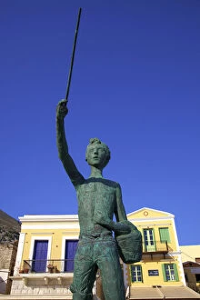 Images Dated 27th July 2015: Statue Of Little Michael The Fisher Boy On Symi Waterfront, Symi, Dodecanese, Greek