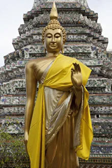 Locations Prints: A statue in front of the Wat Arun Temple in Bangkok Thailand