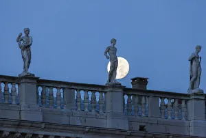 Peter Fischer Prints: Statues of the Marciana librarys building in front of the full Moon, Venice, Veneto