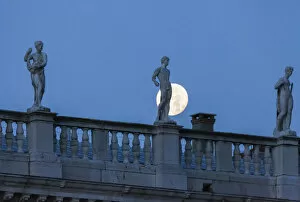 Images Dated 24th May 2018: Statues of the Marciana librarys building in front of the full Moon, Venice, Veneto