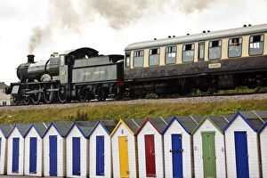 Images Dated 28th June 2011: Steam Train & beach huts, Goodrington, Devon, UK