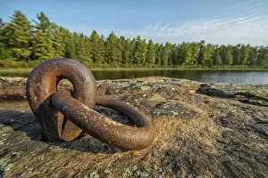 Algonquin Prints: A steel ringlet from the logging days of the late 1800s remains embedded in the Canadian Shield on Lake Travers