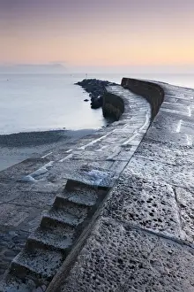 December Prints: Steps leading onto the Cobb harbour wall at Lyme Regis on the Jurassic Coast