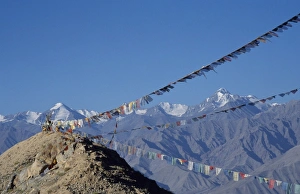 Stok Mountains and prayer flags viewed from Leh Stok Mountains and prayer flags viewed from Leh