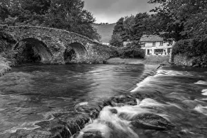 Stone bridge over Badgworthy Water in the picture postcard village of Malmsmead