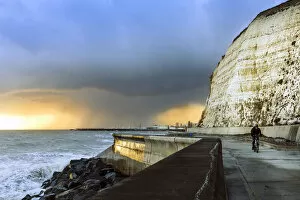 Storm clouds over the English Channel near Brighton with the white cliffs of Peacehaven