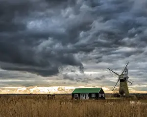 Storm Clouds over St. Benets Mill, Norfolk Broads National Park, Norfolk, England