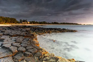 Dramatic Sky Prints: Storm clouds at sunrise over Trou d Eau Douce, Flacq district, Indian Ocean
