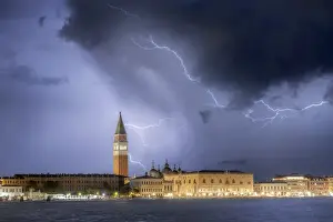 Ancient Building Prints: A stormy late summer night in Venice: pictured in the frame is St