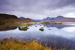 Stormy skies over Lochan Na H-Achlaise on Rannoch Moor in Autumn, Highlands, Scotland