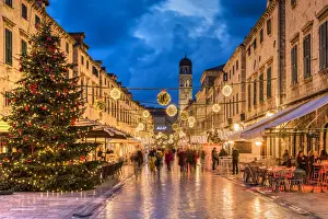 Stradun pedestrian street adorned with Christmas lights and decorations, Dubrovnik