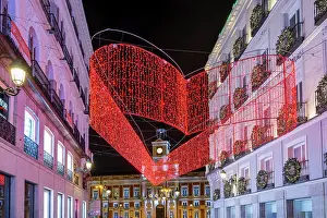 Christmas Lights Prints: Street adorned with Christmas lights near Puerta del Sol, Madrid, Spain