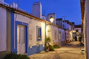 Street of the traditional fishing village of Alcochete, spreading along the river Tagus