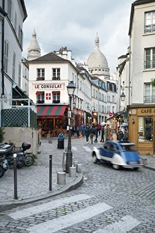Images Dated 19th May 2017: Streets of Montmartre with view towards Basilica Sacre Coeur, Paris, France