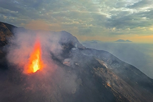 Magma Prints: Stromboli volcano eruption seen from the drone at sunset