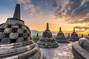 Buddha Gallery: Stupas at sunset, Candi Borobudur buddhist temple, Muntilan, Java, Indonesia