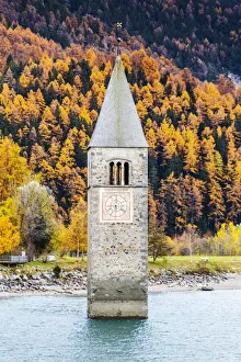 Tower Bell Prints: Submerged tower of Curon Venosta in autumn. Curon Venosta, South Tirol, Italy