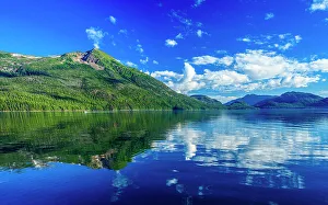Tidal Zone Prints: Summer clouds reflected in calm water, Stikine Strait, Alaska, USA