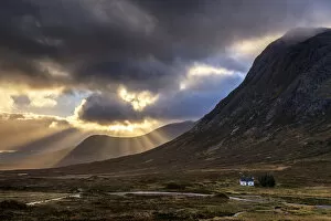 Lone Collection: Sun Beams Through Clouds and Lone Cottage, Glen Coe, Highland Region, Scotland