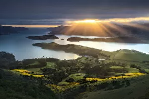 Images Dated 1st November 2019: Sun rays breaking through clouds, from the Port Hills, Christchurch, New Zealand
