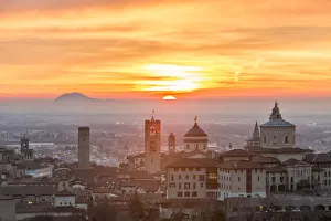 Sun rising above the upper city of Bergamo, Lombardy, italy