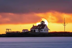 Kittery Prints: Sun rising over Wood Island Liftesaving Station, Kittery Point, Maine, USA