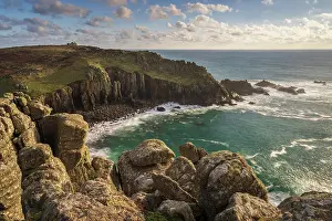 Cliff Tops Prints: Sunny afternoon light on Porth Loe and the dramatic cliff tops of Gwennap Head