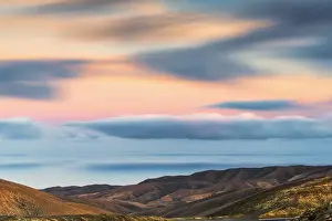 Las Palmas Prints: Sunrise over the desert landscape towards Playa de Garcey from Mirador Sicasumbre