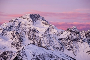 Sunrise on the Disgrazia mountain in winter, Malenco valley, Lombardy, Italy