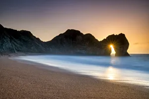 Surf Prints: Sunrise Through Durdle Door, Dorset, England