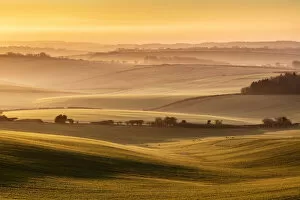 Sunrise over farmland in the Piddle Valley towards Piddlehinton, Dorset, England, UK