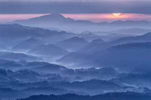 Images Dated 21st December 2020: Sunrise over the foothils of the Kamnik Savinja Alps, Kravavec, Slovenia