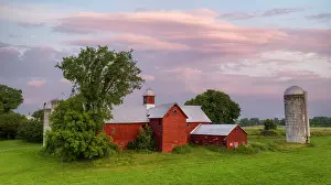 Pastoral Prints: Sunrise at historic red barn with silos, Green Mountains, Charlotte, Vermont, USA