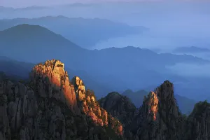 sunrise at Huangshan - China, Anhui, Huangshan, Beginning-To-Beleive Peak - Yellow