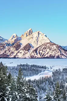 Cold Temperature Prints: Sunrise illuminating the Teton Mountain Range