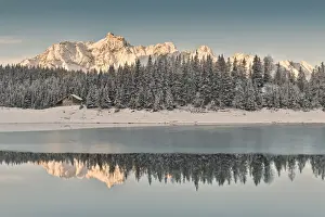 Sunrise on Lake Palu after an early snowfall Malenco Valley Valtellina Lombardy Italy Europe