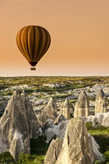 Images Dated 23rd June 2015: Sunrise landscape with hot air balloons, Goreme, Cappadocia, Turkey