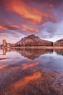 Mount Prints: Sunrise on Lecco mountains (Coltignone) reflected into the Adda River