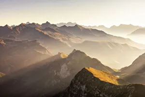 Images Dated 27th February 2023: Sunrise light hit Prealpi Orobie. Serina valley, Lombardy, Italy